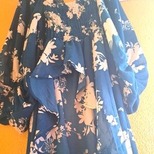 Large 3/4 sleeve dressy shirt.